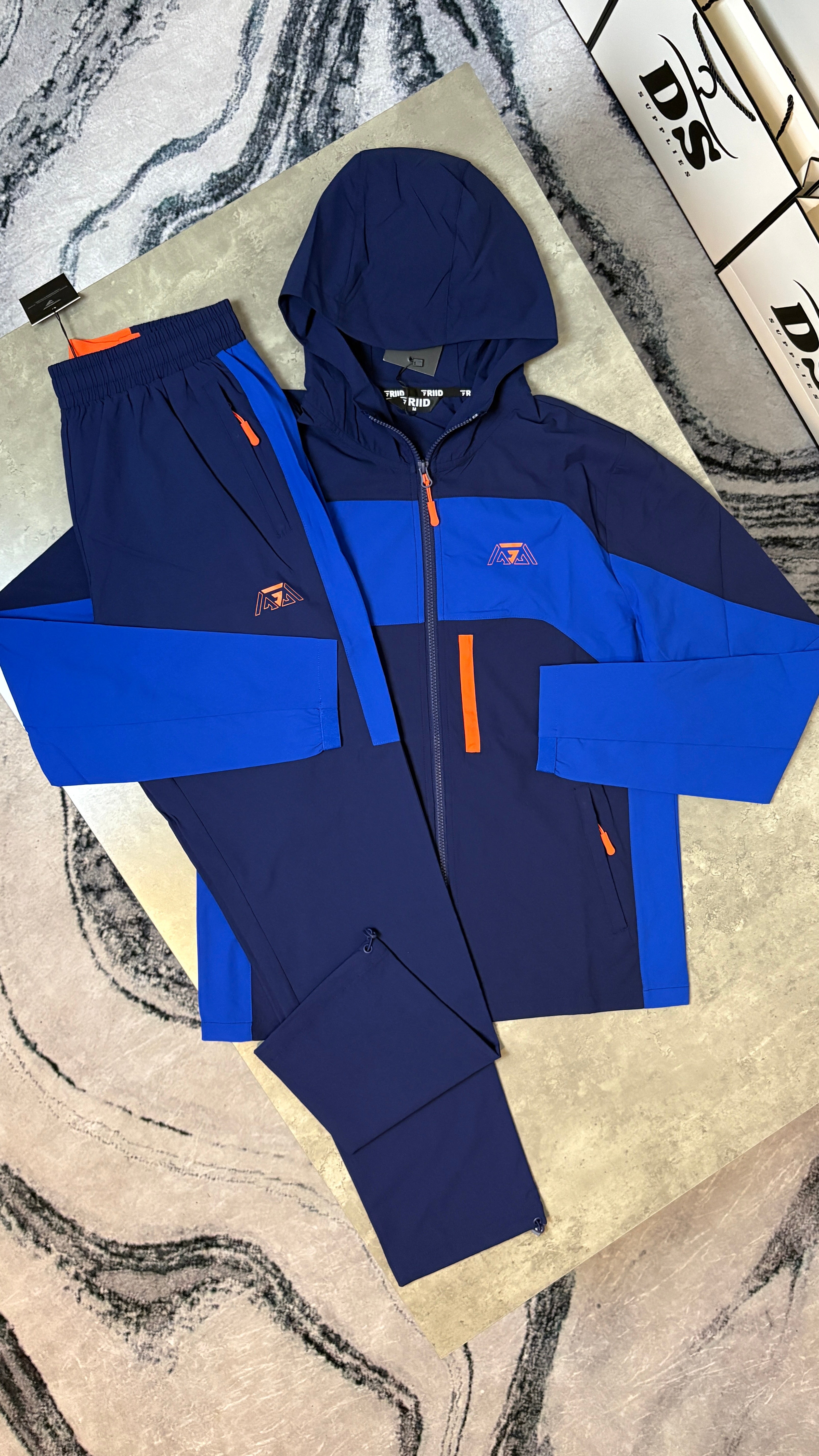 GRIID RIDGE TRACKSUIT JACKET/PANTS - NAVY/BLUE/ORANGE